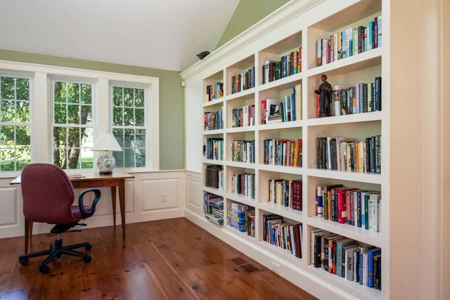 149 East Bay Road Osterville, MA 02655 - Photo 16 of 39 a view of a workspace with bookshelf and a window