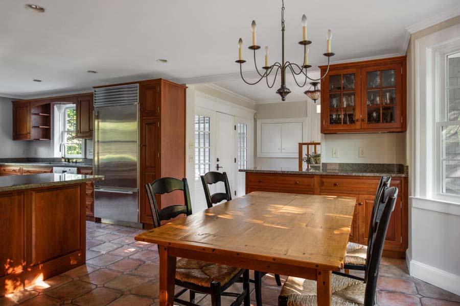 149 East Bay Road Osterville, MA 02655 - Photo 20 of 39 a dining table with chairs and wooden floor