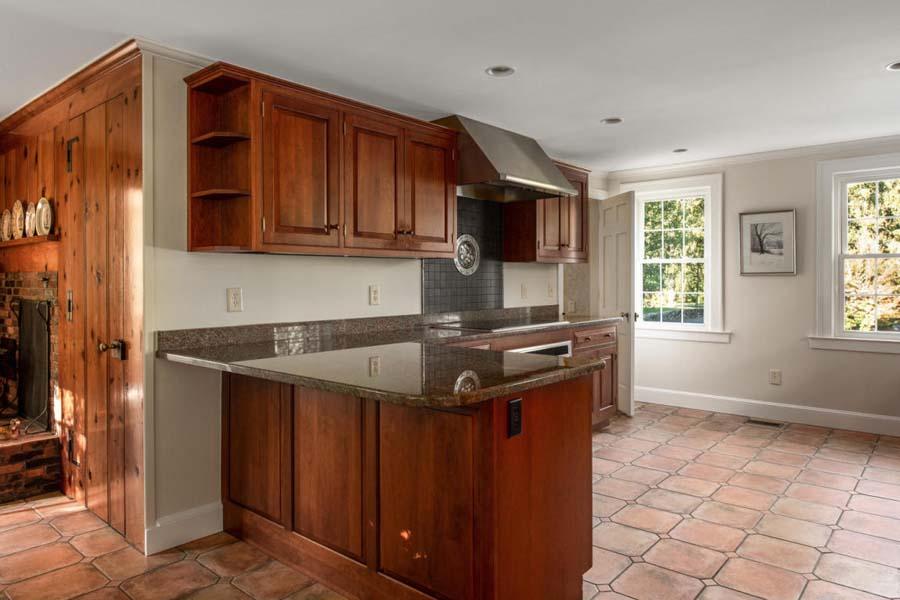 149 East Bay Road Osterville, MA 02655 - Photo 21 of 39 a kitchen with stainless steel appliances granite countertop a stove a sink and a microwave