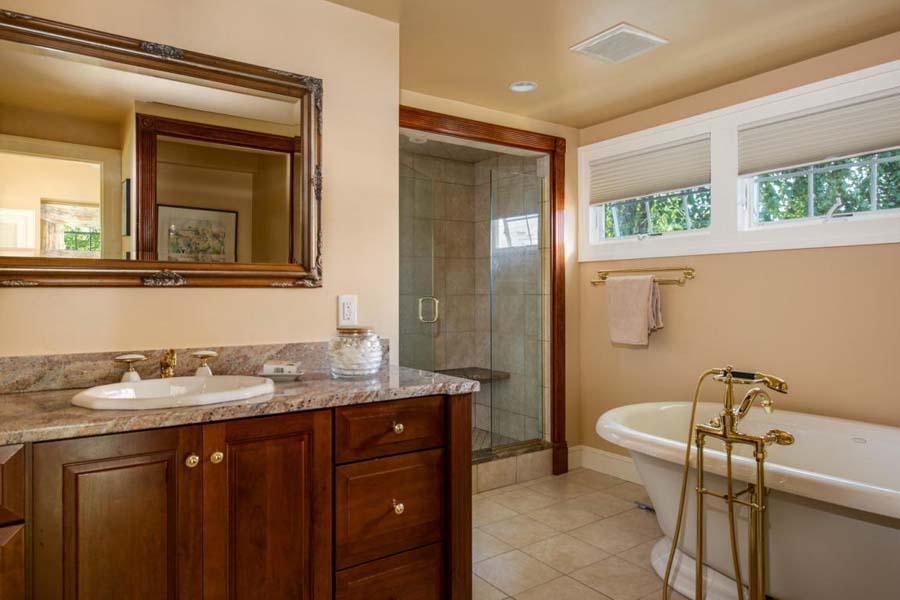 149 East Bay Road Osterville, MA 02655 - Photo 24 of 39 a bathroom with a granite countertop sink toilet and mirror