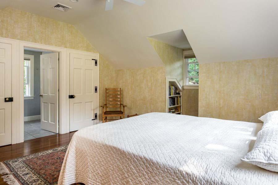 149 East Bay Road Osterville, MA 02655 - Photo 26 of 39 a bedroom with a bed and a wooden floor
