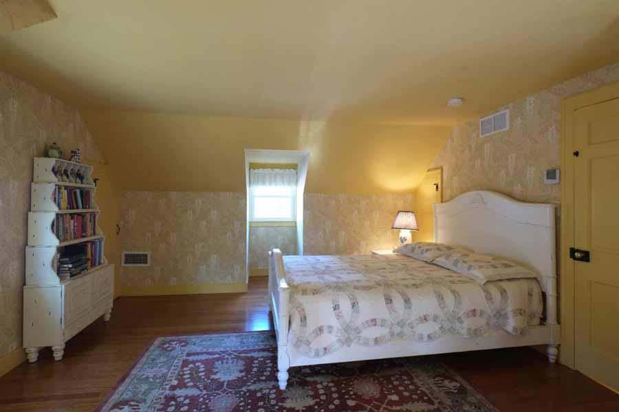 149 East Bay Road Osterville, MA 02655 - Photo 29 of 39 a bedroom with a bed and wooden floor