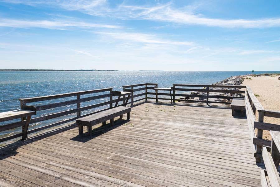 149 East Bay Road Osterville, MA 02655 - Photo 36 of 39 a view of a terrace with wooden floor and seating