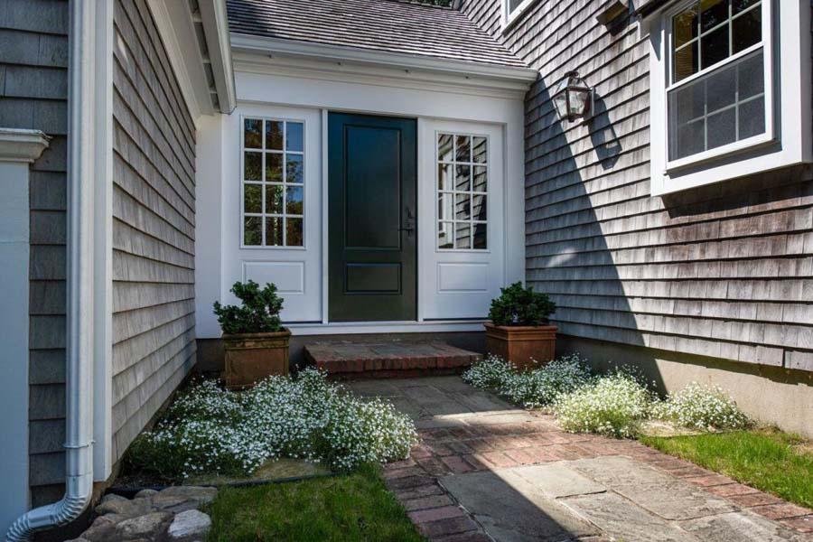 149 East Bay Road Osterville, MA 02655 - Photo 10 of 39 a view of house with backyard and garden