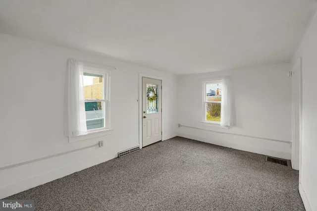 an empty room with a window