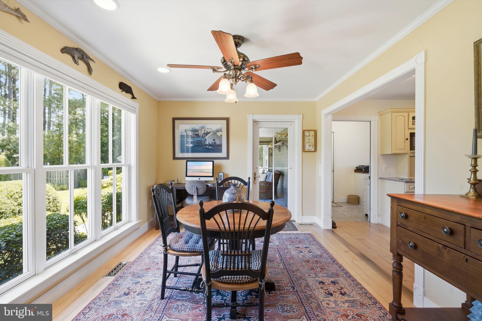 26226 Langs Landing Road Oxford, MD 21654 - Photo 14 of 48 a dining room with furniture and window