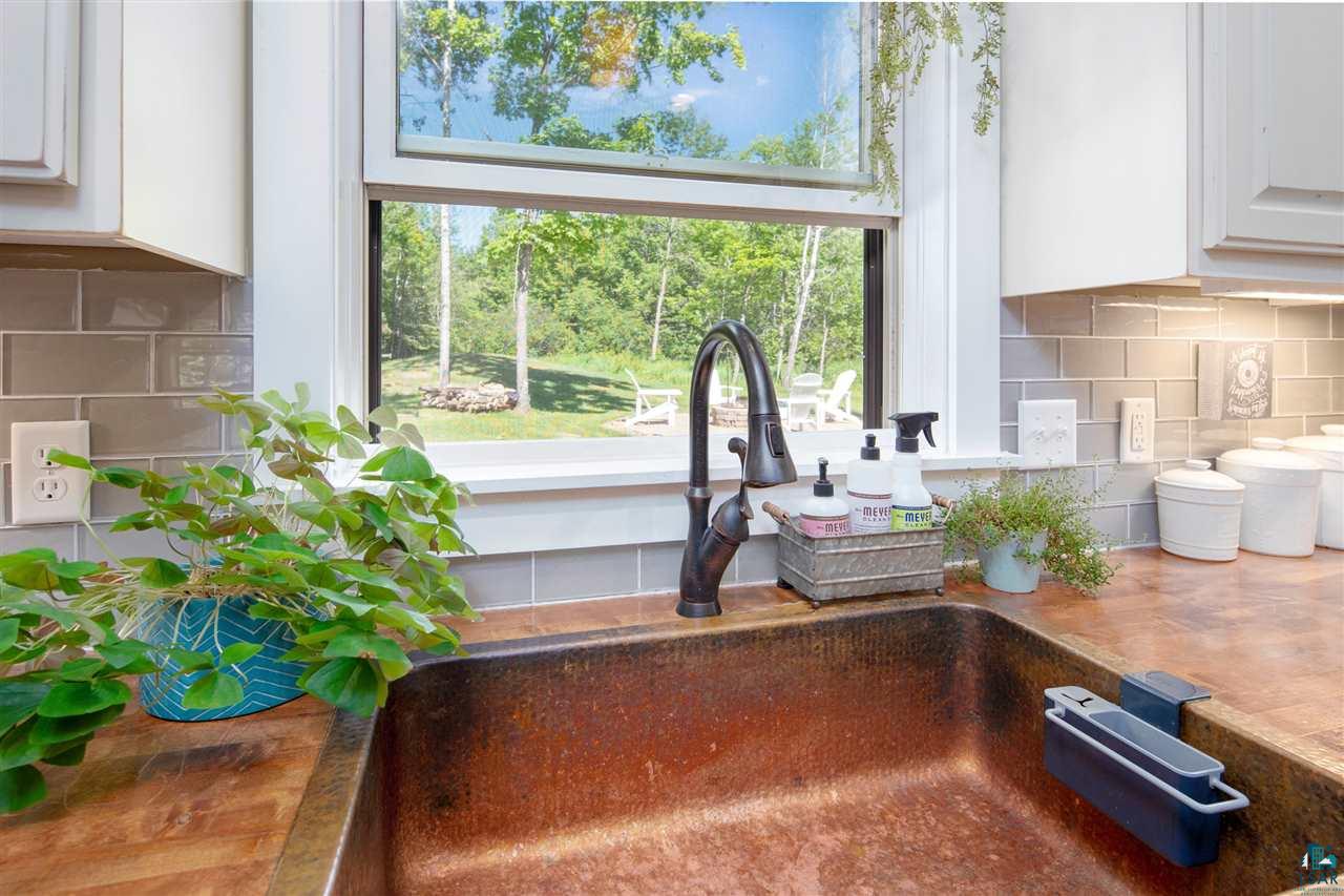 5220 Olson Road Duluth, MN 55803 - Photo 14 of 44 A copper sink is a neat upgrade!