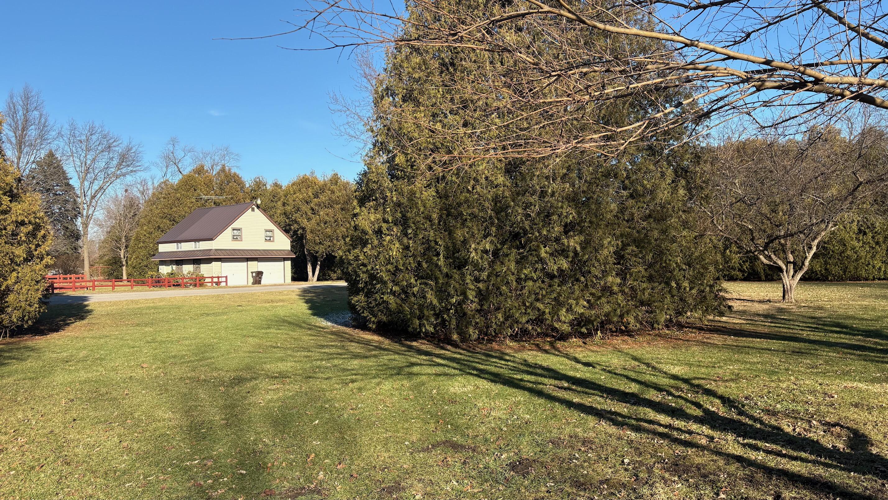 23503 Shelby Road Shelby, IN 46356 - Photo 12 of 17 a view of a house with a yard