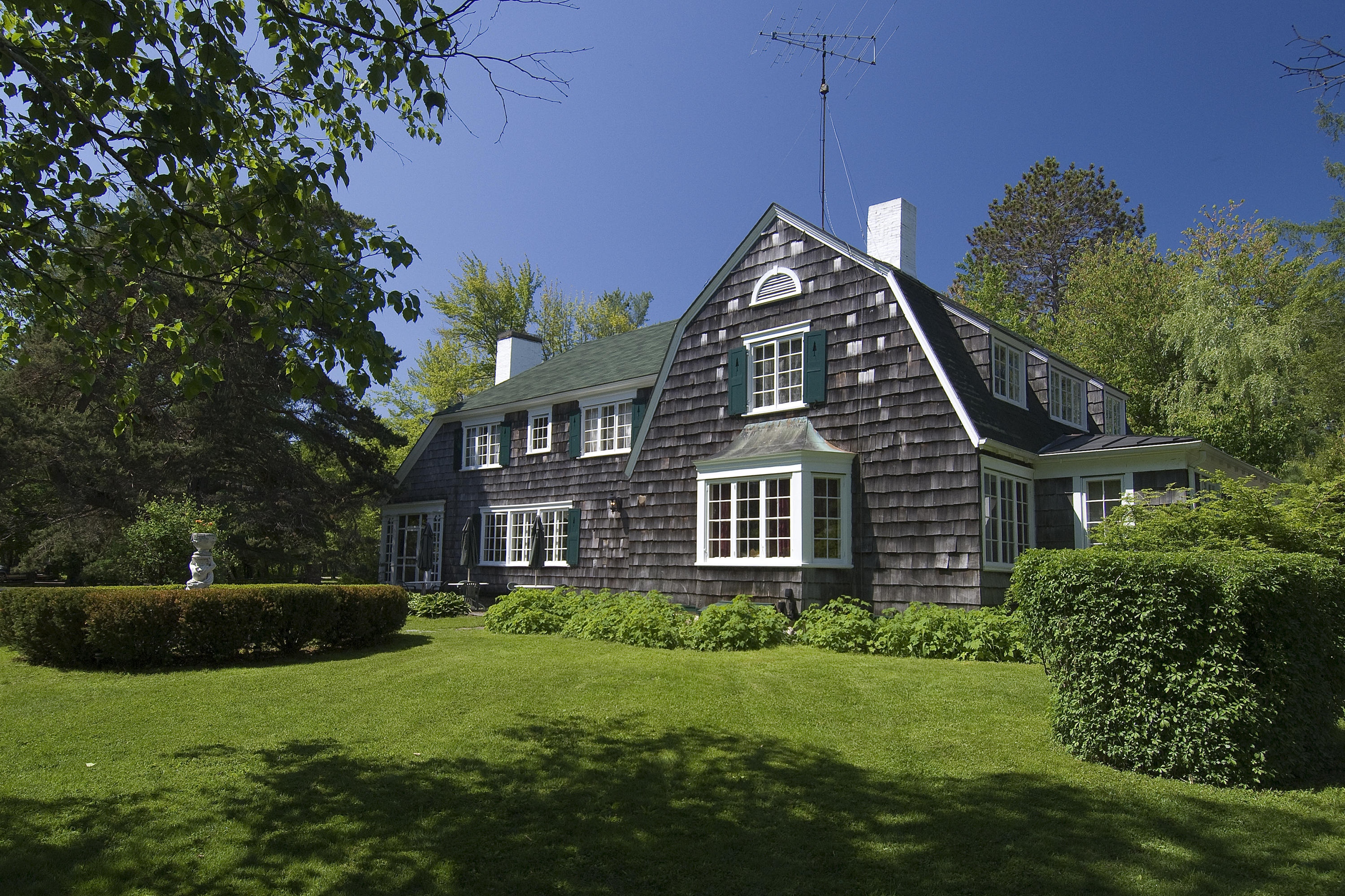 68 Beach Road Madison, ME 04950 - Photo 32 of 43 wood shingles and copper window flashing