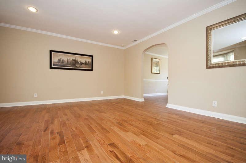 1505 Northgate Road Baltimore, MD 21218 - Photo 2 of 24 a view of an empty room with wooden floor