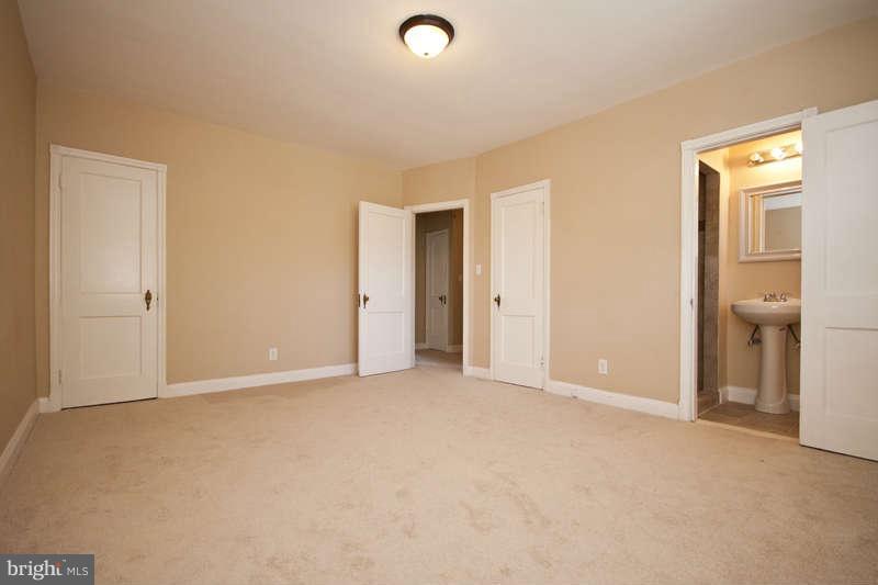 1505 Northgate Road Baltimore, MD 21218 - Photo 12 of 24 a view of an empty room with closet and a window