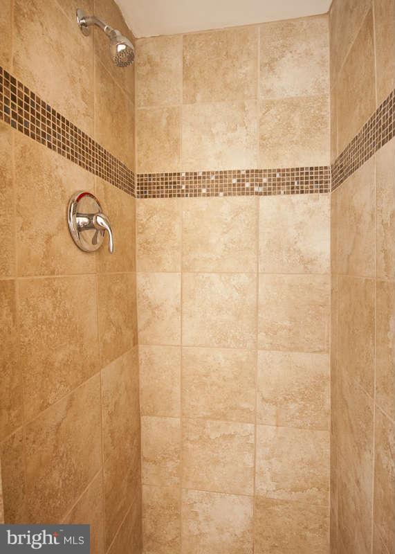 1505 Northgate Road Baltimore, MD 21218 - Photo 13 of 24 a bathroom with a shower