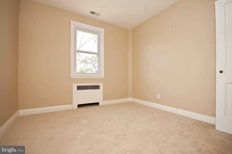 1505 Northgate Road Baltimore, MD 21218 - Photo 16 of 24 an empty room with windows
