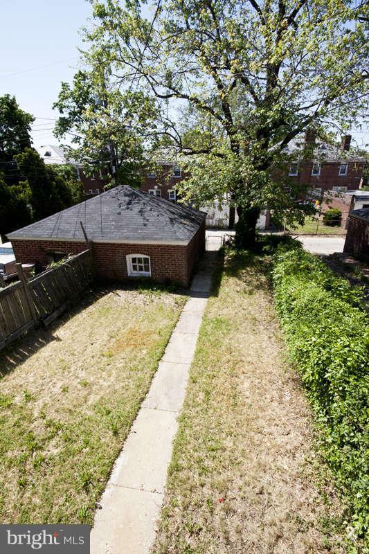 1505 Northgate Road Baltimore, MD 21218 - Photo 24 of 24 a view of swimming pool with lawn chairs and plants
