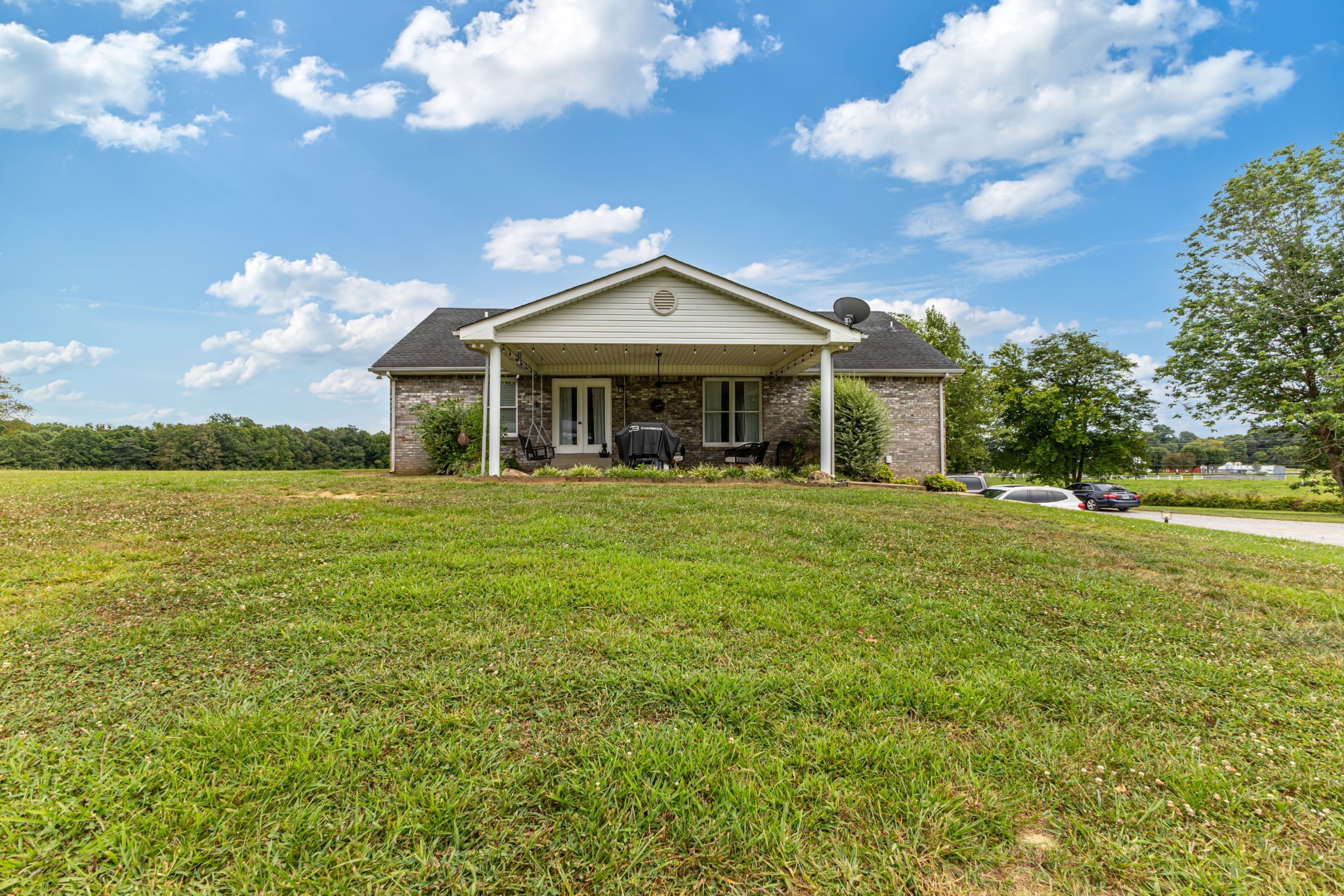 6150 Highway 41 A Pleasant View, TN 37146 - Photo 16 of 34 a front view of a house with a yard