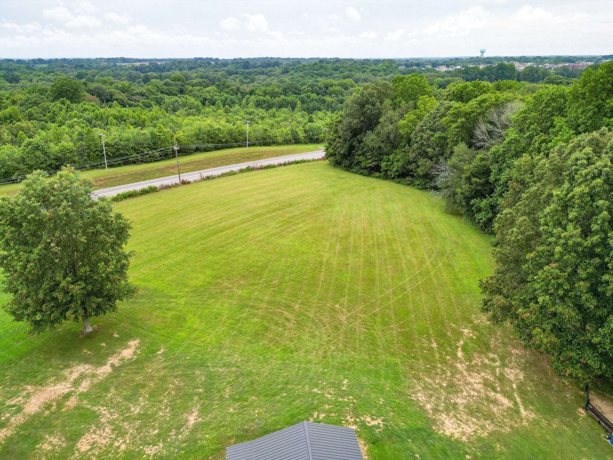 6150 Highway 41 A Pleasant View, TN 37146 - Photo 29 of 34 a view of a yard with an outdoor space