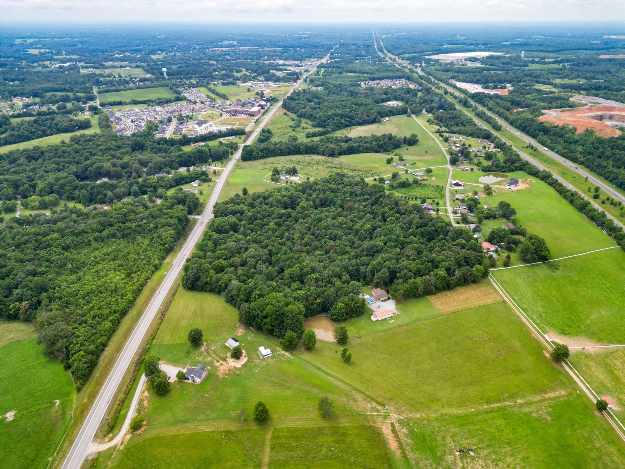 6150 Highway 41 A Pleasant View, TN 37146 - Photo 31 of 34 an aerial view of lake residential houses with outdoor space and swimming pool