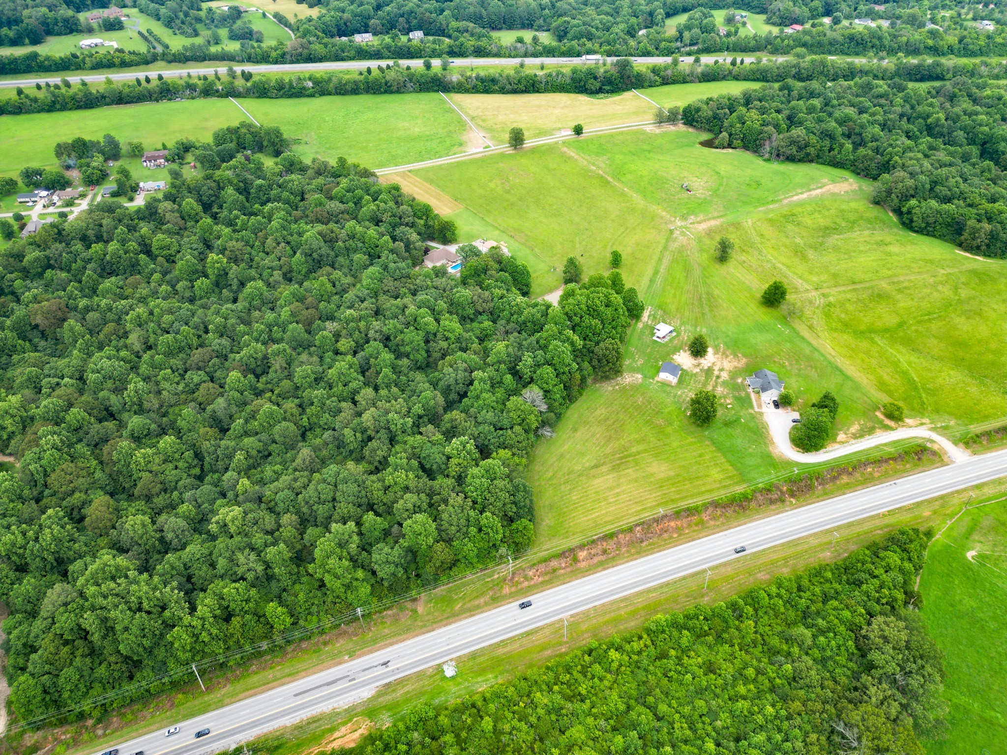 6150 Highway 41 A Pleasant View, TN 37146 - Photo 7 of 34 a view of a yard with an outdoor space