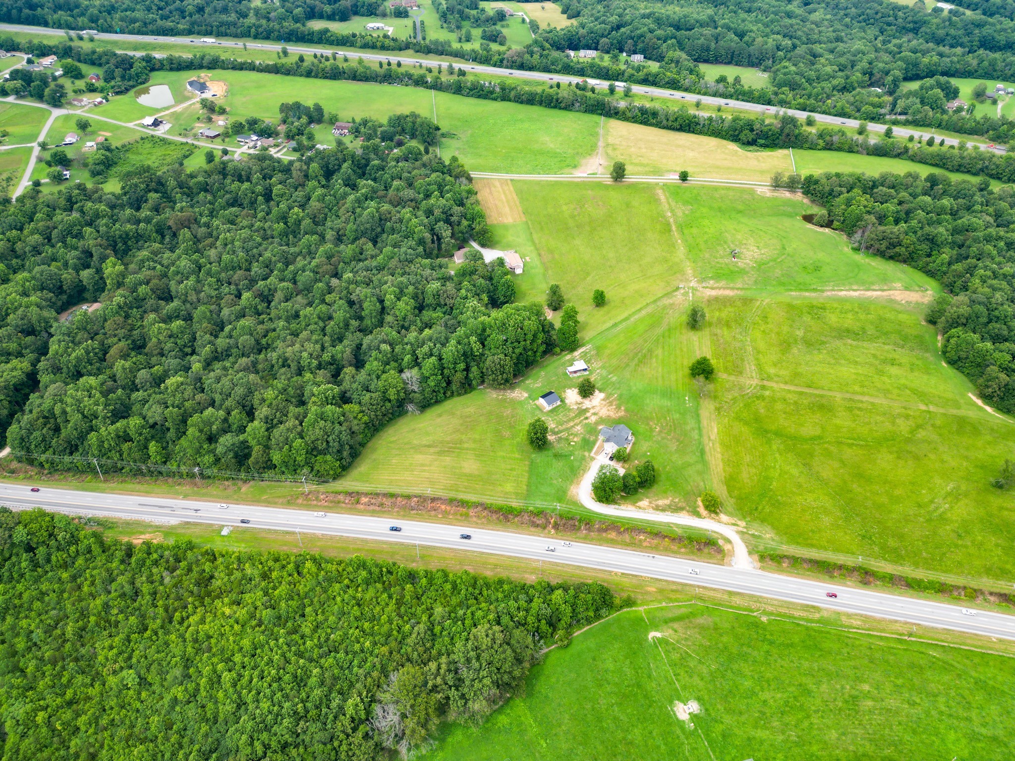 6150 Highway 41 A Pleasant View, TN 37146 - Photo 8 of 34 a view of a water pond with green yard
