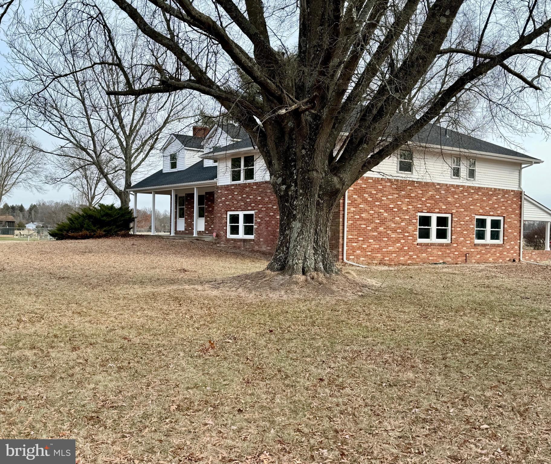 643 Chatsworth Road Tabernacle, NJ 08088 - Photo 26 of 27 a tree in front of a white house