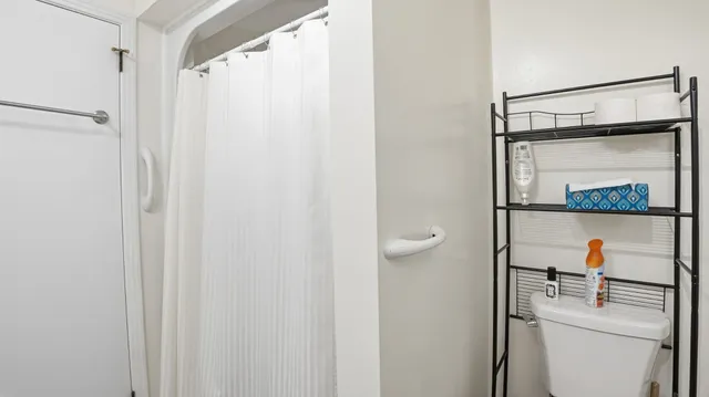 a kitchen with stainless steel appliances granite countertop a refrigerator a sink dishwasher stove and oven