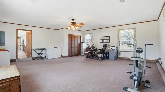 a view of yard with a table and chairs
