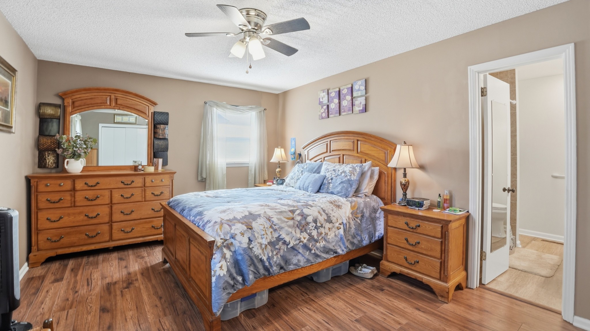 509 12 Oaks Road Tullahoma, TN 37388 - Photo 31 of 60 a bedroom with a bed and a dresser