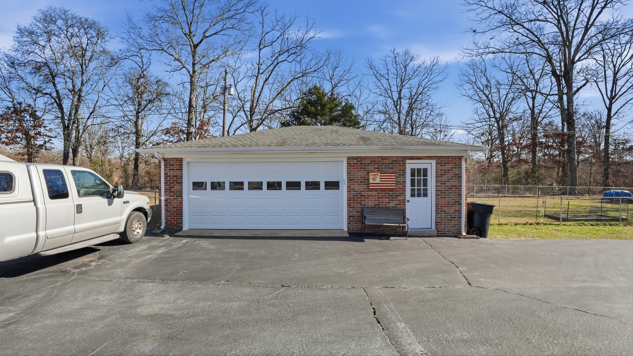 509 12 Oaks Road Tullahoma, TN 37388 - Photo 39 of 60 a view of a house with a big yard and large trees