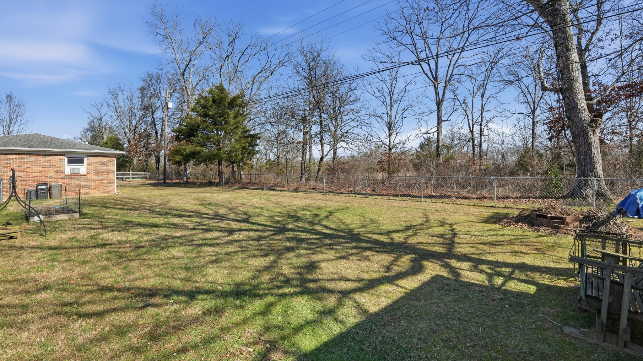 509 12 Oaks Road Tullahoma, TN 37388 - Photo 47 of 60 a view of a yard with an outdoor space