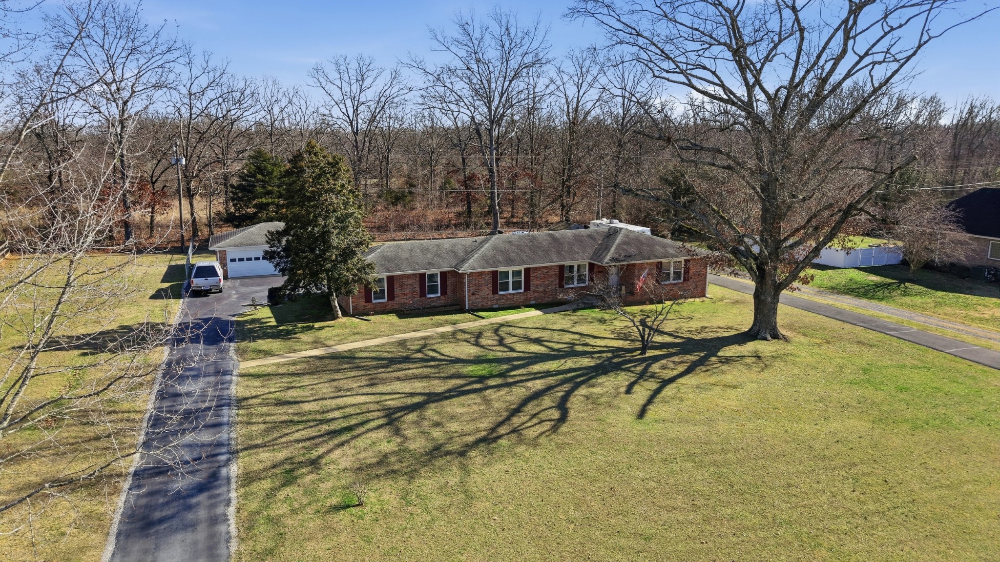 509 12 Oaks Road Tullahoma, TN 37388 - Photo 51 of 60 a view of a house with pool and sitting area