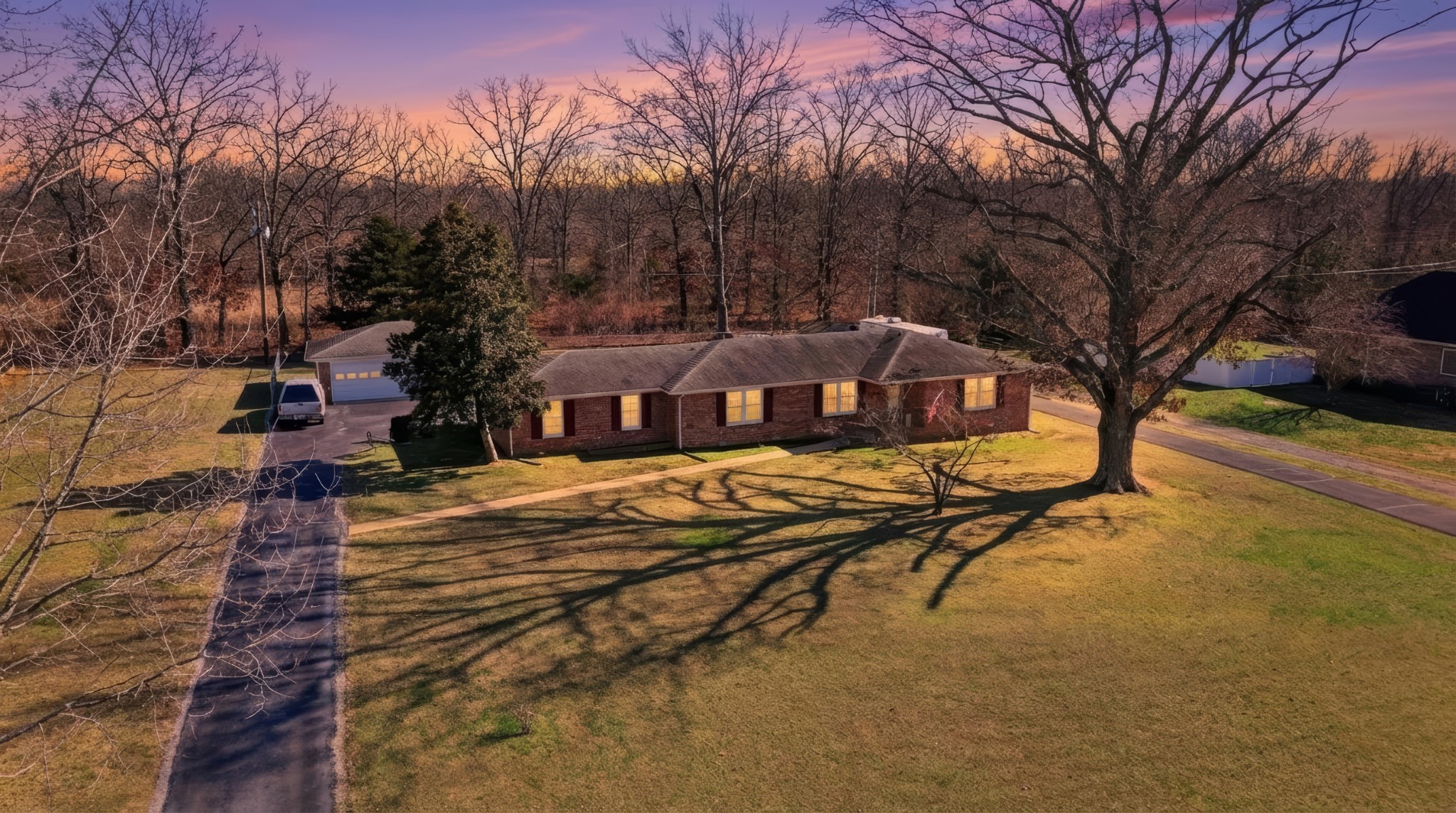 509 12 Oaks Road Tullahoma, TN 37388 - Photo 52 of 60 a view of a house with snow on the side of the road