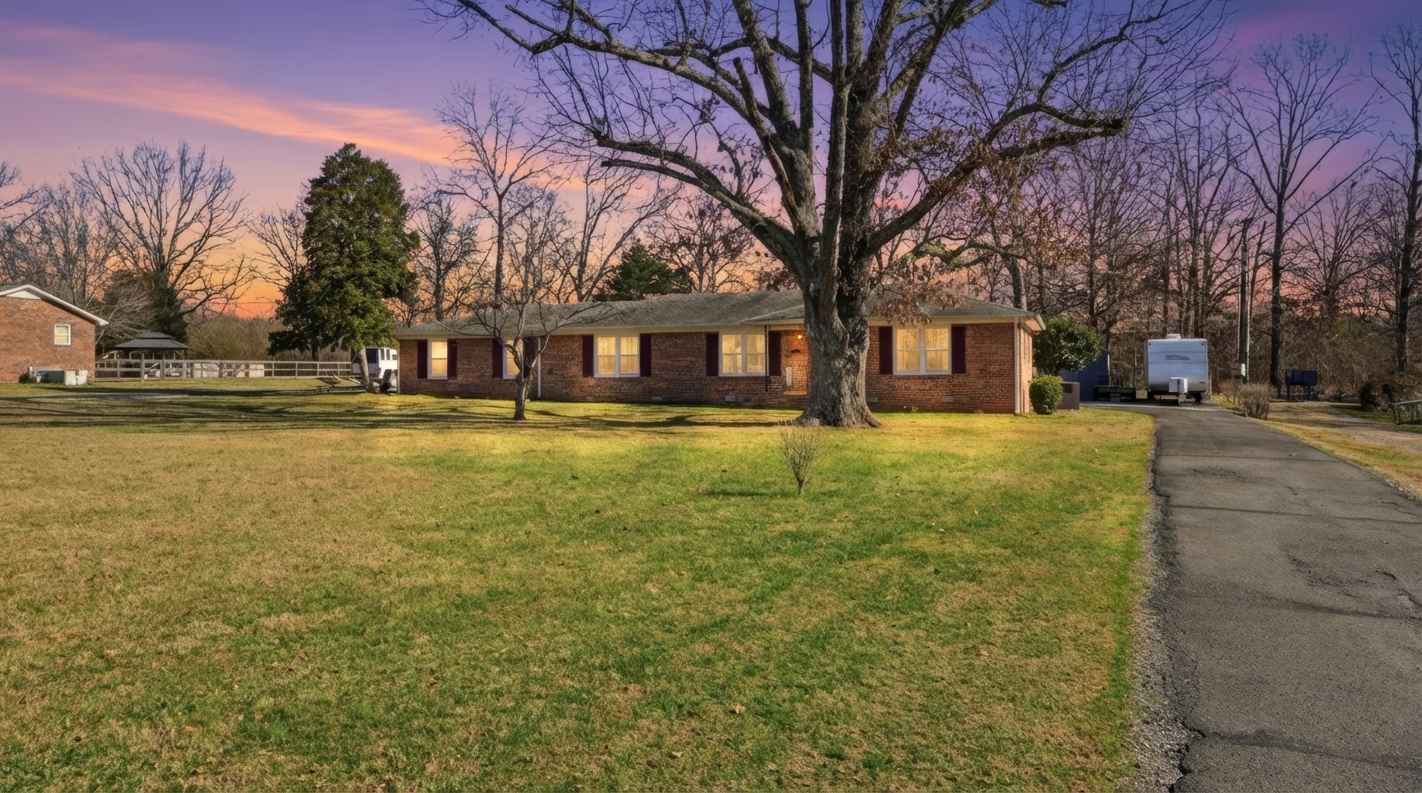 509 12 Oaks Road Tullahoma, TN 37388 - Photo 6 of 60 a view of a house with swimming pool in front of residential building and trees