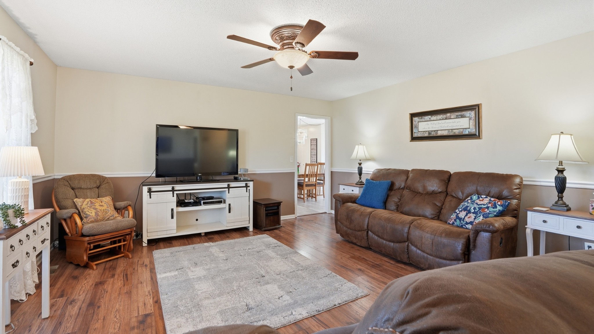 509 12 Oaks Road Tullahoma, TN 37388 - Photo 7 of 60 a living room with furniture and a flat screen tv
