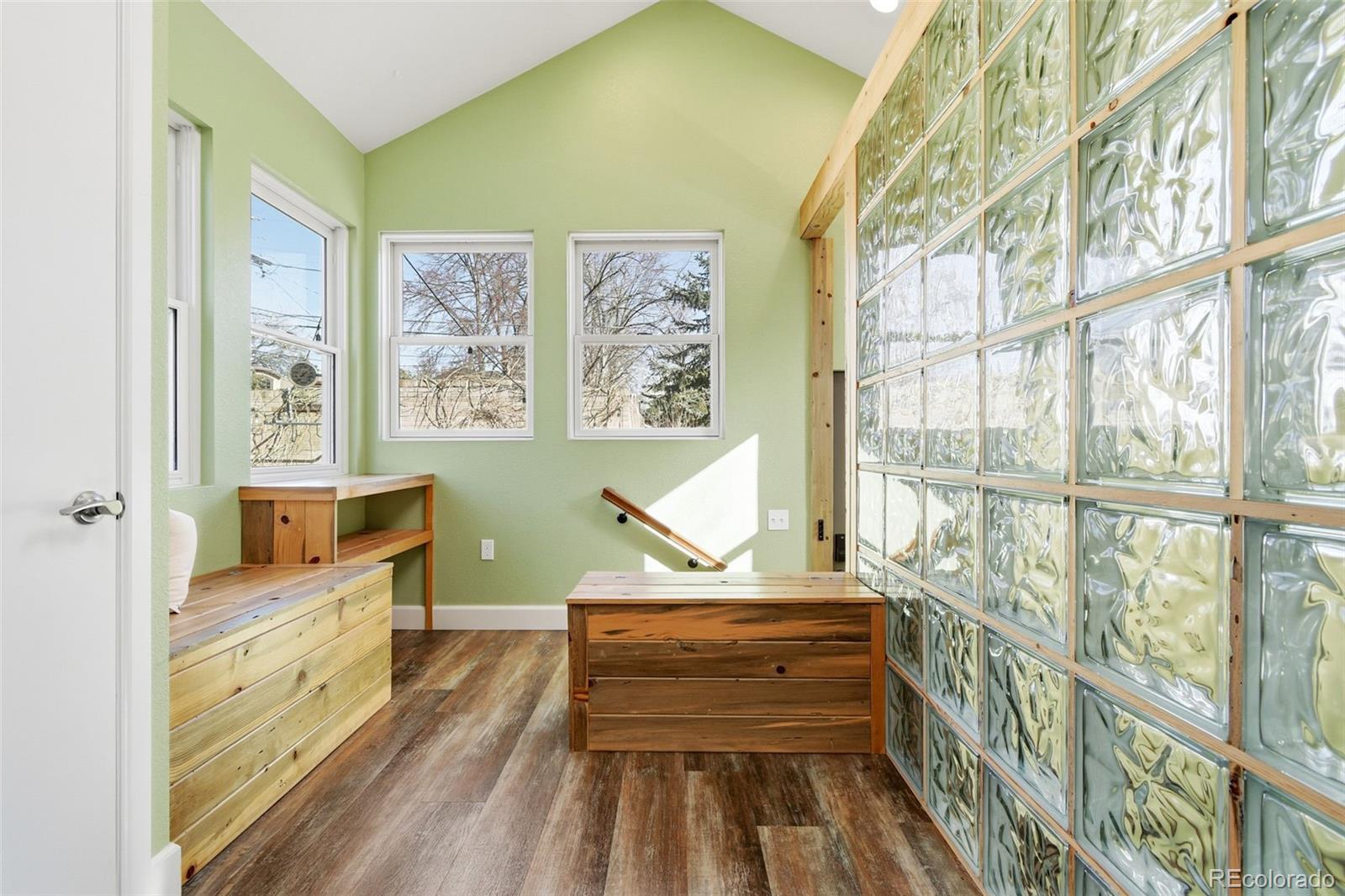 1318 South York Street Denver, CO 80210 - Photo 29 of 49 a view of a room with furniture and windows