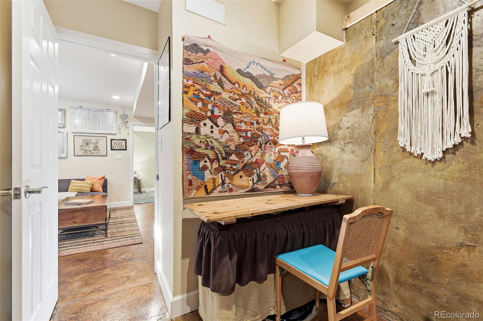 1318 South York Street Denver, CO 80210 - Photo 44 of 49 a view of a room with furniture and wooden floor
