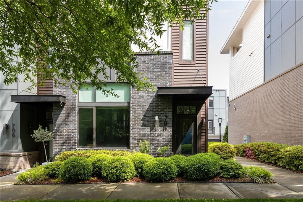 708 Oakview Road Decatur, GA 30030 - Photo 1 of 1 a front view of a house with a yard