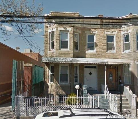 33-28 100th St  