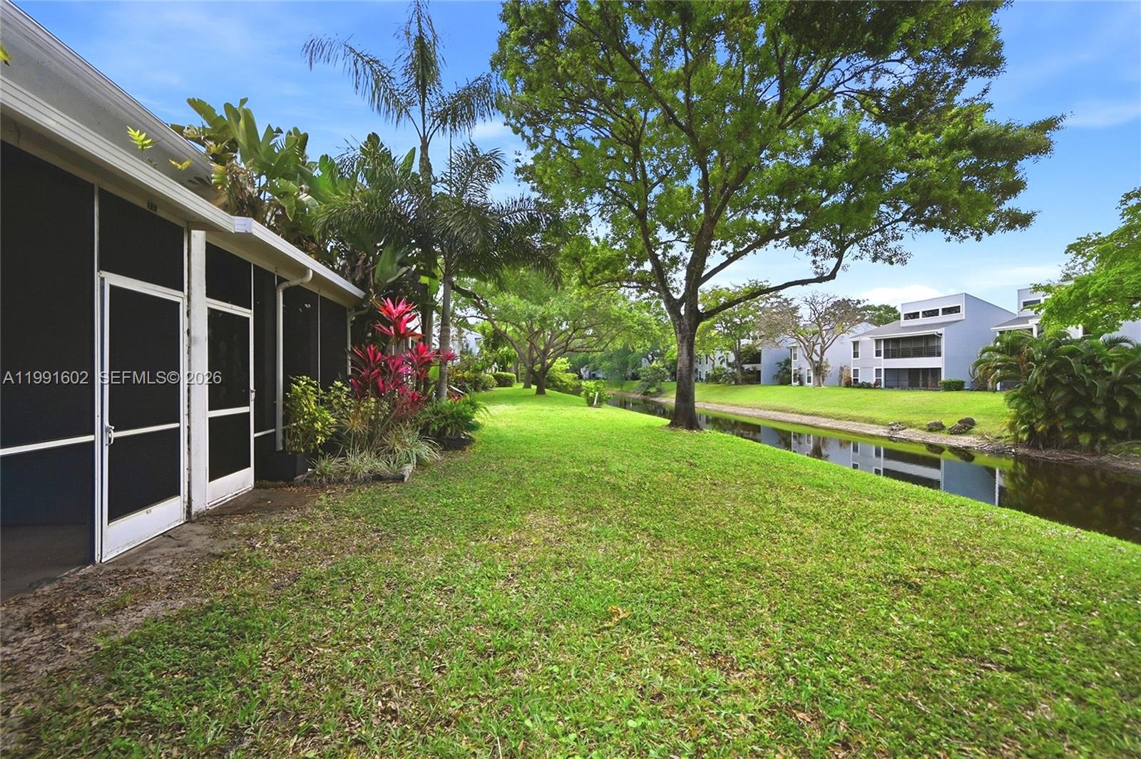 6215 Old Court Road, Unit 505 Boca Raton, FL 33433 - Photo 34 of 36 a view of an house with backyard space and garden