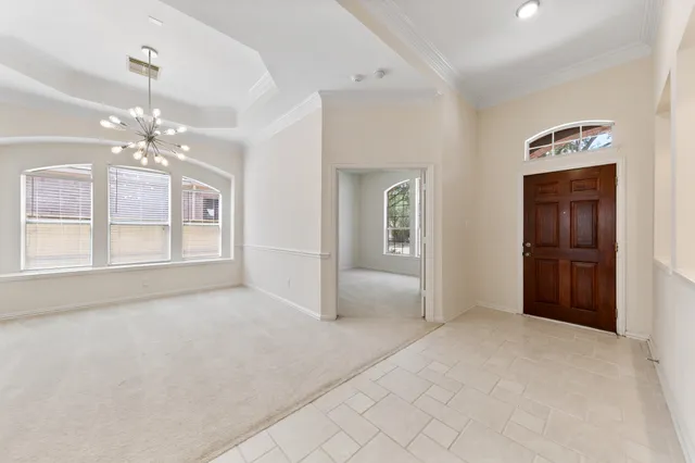 a view of an empty room with a bathroom
