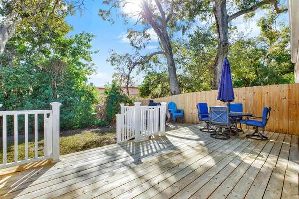 a view of a chairs on the roof deck
