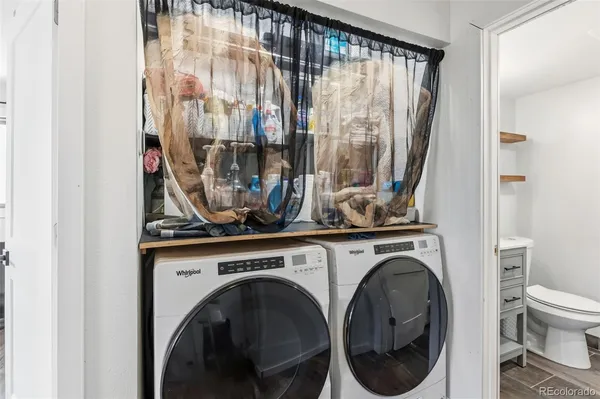 a view of living room with washer and dryer