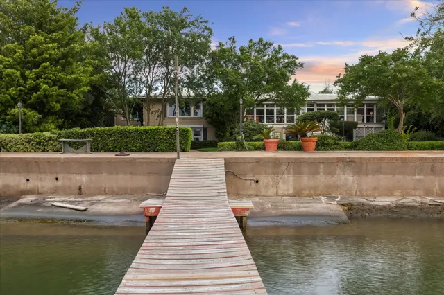 a view of swimming pool with a patio