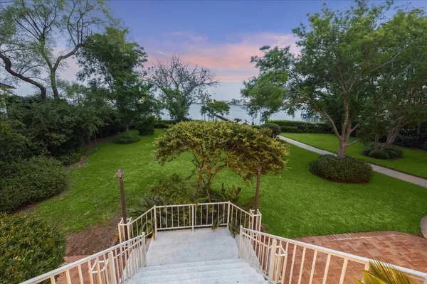 a view of a deck and a garden