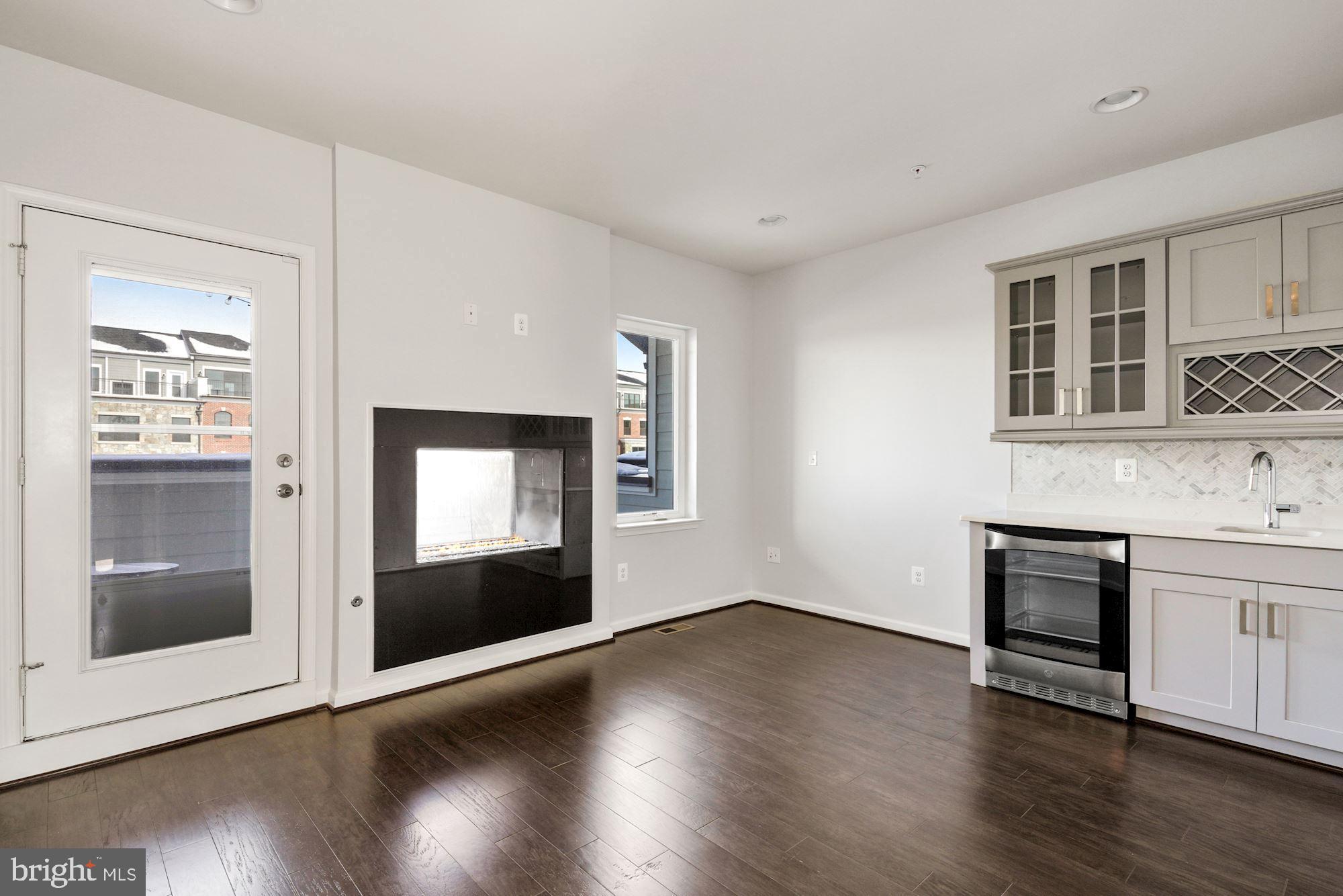 506 Riversail Lane, Unit 435 National Harbor, MD 20745 - Photo 23 of 37 Upper level loft with gas fireplace/wet bar