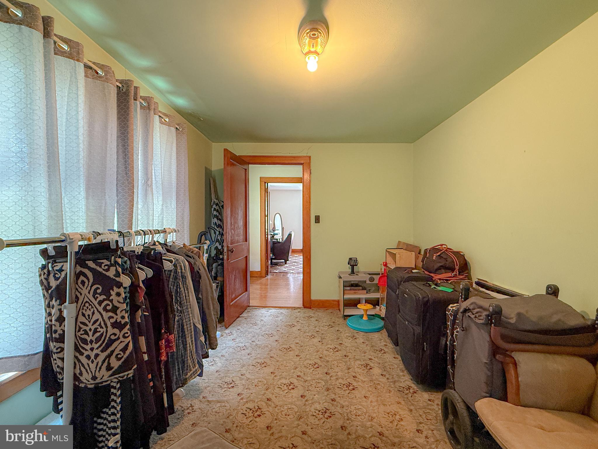 930 Osman Road Alum Bank, PA 15521 - Photo 19 of 63 a view of walk in closet with clothes and shoes