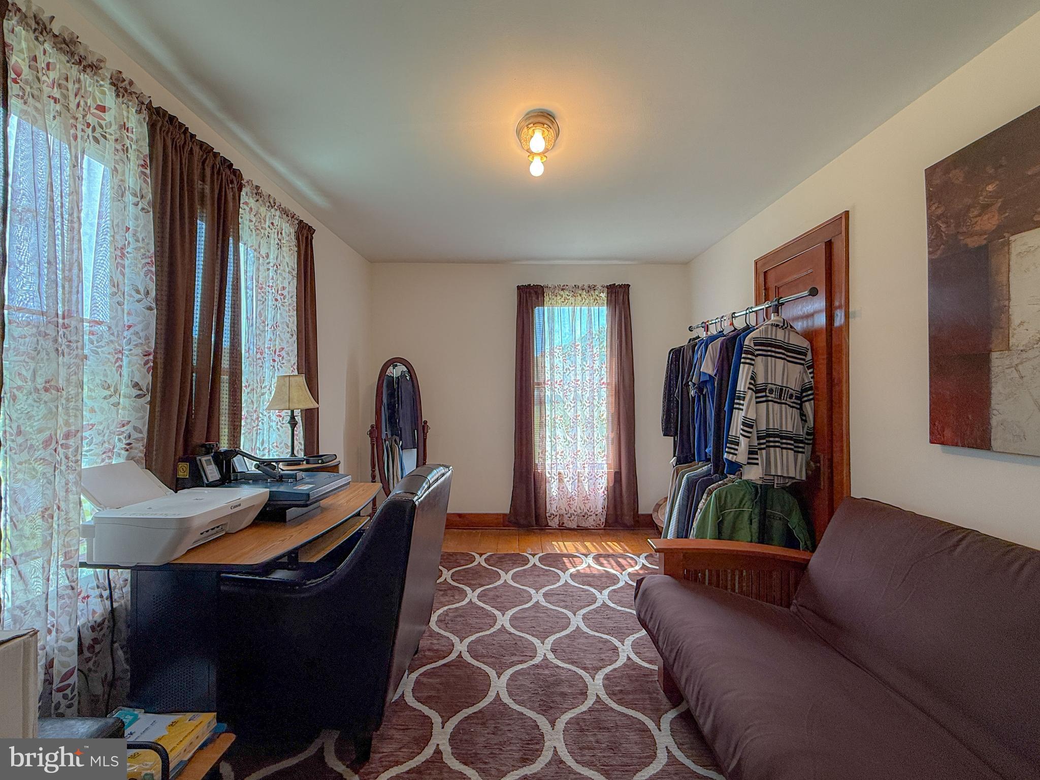 930 Osman Road Alum Bank, PA 15521 - Photo 26 of 63 a living room with furniture and a window