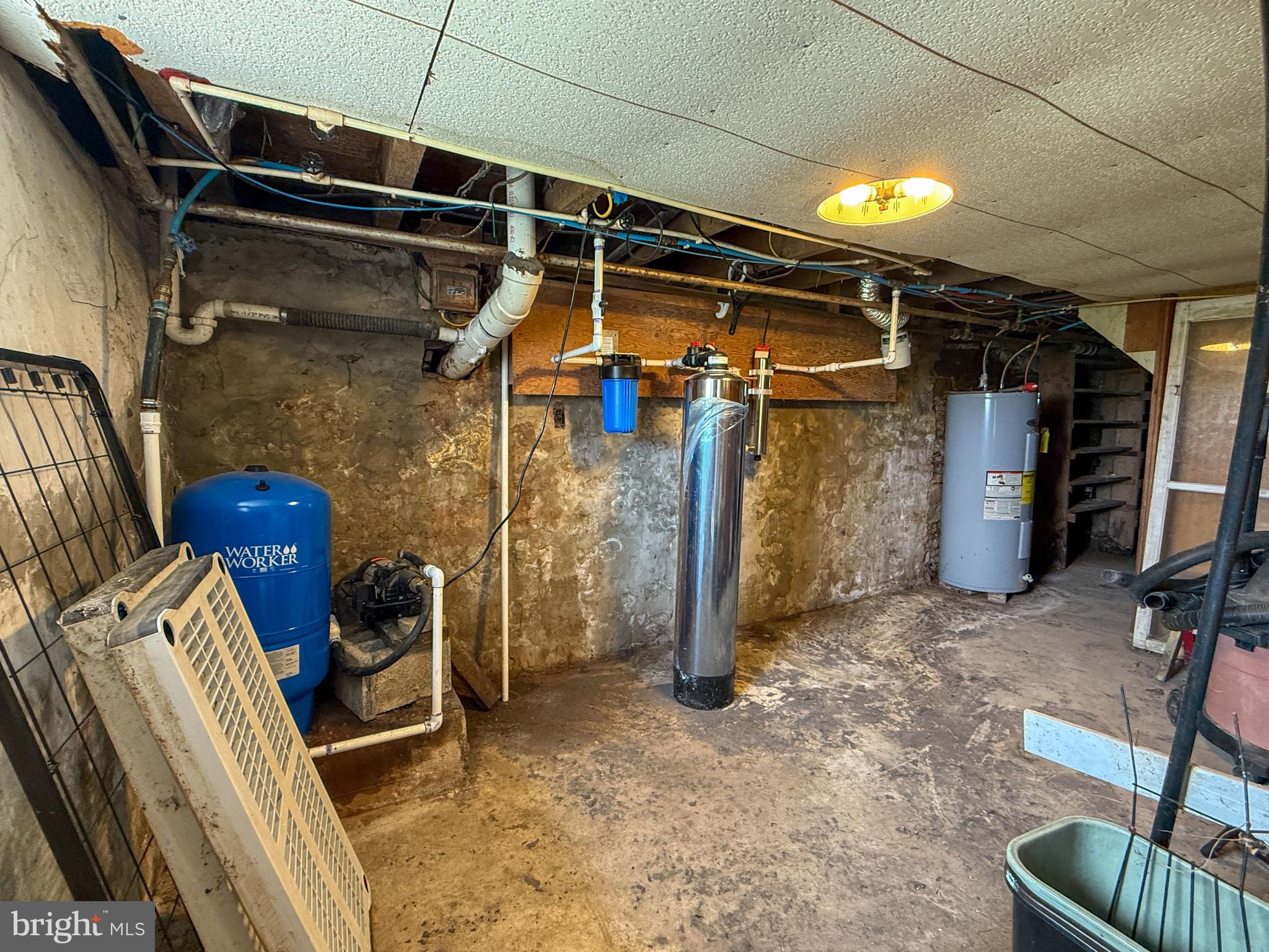 930 Osman Road Alum Bank, PA 15521 - Photo 27 of 63 a view of walk in closet with clothes and shoes