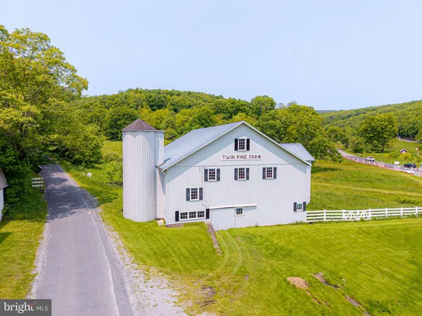a outdoor space with lots of furniture and chandelier