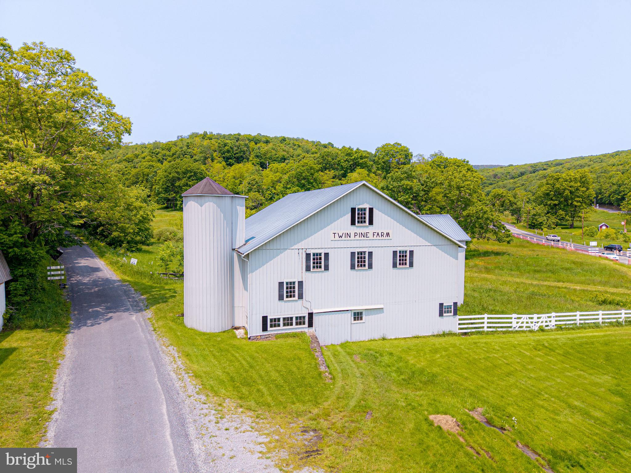930 Osman Road Alum Bank, PA 15521 - Photo 33 of 63 a view of a house with a yard