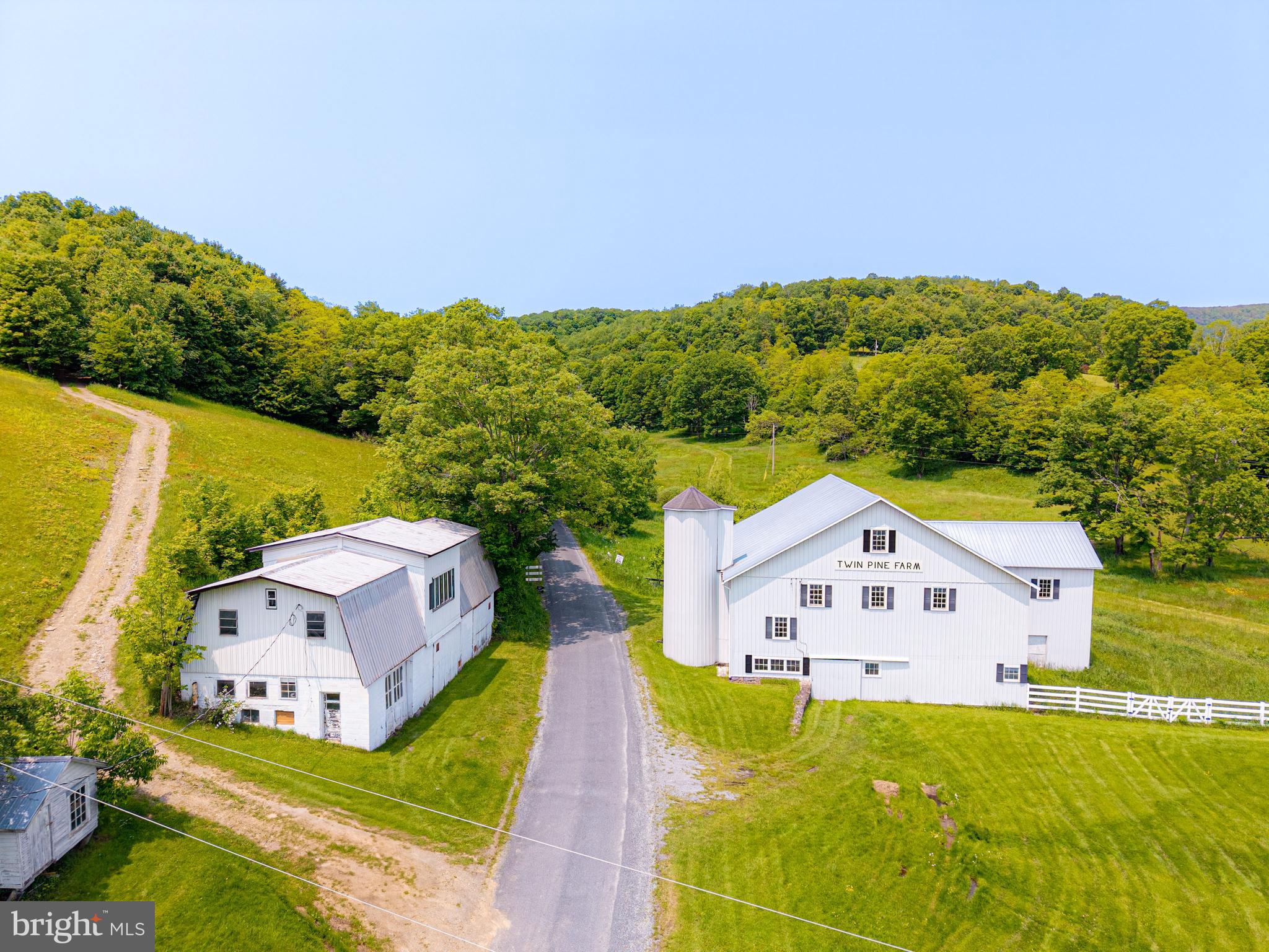 930 Osman Road Alum Bank, PA 15521 - Photo 45 of 66 a view of house with garden space and street view